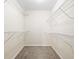 Walk-in closet with carpet and wire shelving at 4140 Riverlook Parkway Se Se Pkwy # 209, Marietta, GA 30067