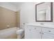 Bathroom with tub-shower, vanity, and tile floor at 5139 Peachtree Road, Chamblee, GA 30341