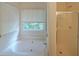 This bathroom features a soaking tub and a separate shower stall at 5176 Shotwell St, Woodstock, GA 30188