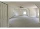 Spacious bedroom with plush carpet and large windows at 5176 Shotwell St, Woodstock, GA 30188