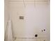 Laundry room with white tile flooring and washer/dryer hookups at 5176 Shotwell St, Woodstock, GA 30188