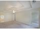 Spacious main bedroom featuring a tray ceiling and multiple closets for ample storage at 5176 Shotwell St, Woodstock, GA 30188