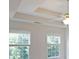 Windows illuminate this bedroom at 5176 Shotwell St, Woodstock, GA 30188