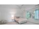 Attic bedroom featuring neutral walls, soft carpet, and a window for natural light at 7045 Hunters Ne Knl, Sandy Springs, GA 30328