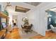 Elegant dining area featuring hardwood floors and an open view through to the living spaces at 1166 Virginia Avenue Ne Ave # 8, Atlanta, GA 30306