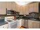 Modern kitchen with stainless steel appliances, light cabinetry, and functional layout at 1166 Virginia Avenue Ne Ave # 8, Atlanta, GA 30306