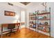 Bright office features hardwood floors, a functional desk, and shelving for books and decor at 1166 Virginia Avenue Ne Ave # 8, Atlanta, GA 30306