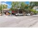 Street scene features a variety of businesses with parking available and trees adding to the ambiance at 1166 Virginia Avenue Ne Ave # 8, Atlanta, GA 30306