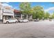 Charming street view showcasing nearby shops and restaurants, with visible street parking at 1166 Virginia Avenue Ne Ave # 8, Atlanta, GA 30306
