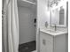 Modern bathroom featuring white subway tile shower and elegant vanity with designer fixtures at 3402 Devoe Ct, Marietta, GA 30062