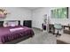 Cozy bedroom featuring a bed, desk and comfortable decor at 3402 Devoe Ct, Marietta, GA 30062