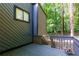 Exterior view of a house from a wood deck, with forest views at 3402 Devoe Ct, Marietta, GA 30062
