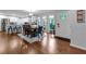 Bright kitchen with stainless appliances, white cabinets and a breakfast bar with modern stools plus a dining area at 3402 Devoe Ct, Marietta, GA 30062