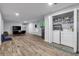 This finished basement features a convenient, enclosed laundry area with modern washer and dryer at 3402 Devoe Ct, Marietta, GA 30062