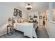 Cozy loft bedroom with decor features comfortable queen bed and decorative wall art at 3655 Habersham Ne Rd # 344, Atlanta, GA 30305