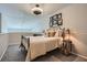 Cozy bedroom with neutral tones, decorative lighting, and a comfortable queen-size bed at 3655 Habersham Ne Rd # 344, Atlanta, GA 30305