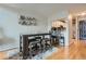 Dining area with a breakfast bar, modern table and seating, open view to the kitchen, and stylish decor at 3655 Habersham Ne Rd # 344, Atlanta, GA 30305