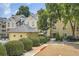 Inviting condominium complex featuring well-manicured landscaping and a community pool, perfect for relaxation at 3655 Habersham Ne Rd # 344, Atlanta, GA 30305