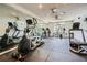 Spacious gym with mirrored walls, multiple ceiling fans, and an assortment of exercise equipment at 3655 Habersham Ne Rd # 344, Atlanta, GA 30305
