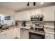 Kitchen with stainless steel appliances, modern countertops, and open space, perfect for cooking and entertaining guests at 3655 Habersham Ne Rd # 344, Atlanta, GA 30305