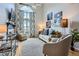 Bright living room with large windows and neutral décor creates a relaxing and inviting atmosphere at 3655 Habersham Ne Rd # 344, Atlanta, GA 30305