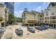 Exterior shot of parking lot featuring assigned parking and elevated balconies with covered seating areas at 3655 Habersham Ne Rd # 344, Atlanta, GA 30305