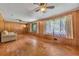 Cozy living room with original hardwood flooring and natural light from the large windows at 434 Terrace Sw Dr, Smyrna, GA 30082