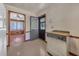 The mud room features dual exterior doors, vintage washer and dryer connections, and view into living room at 434 Terrace Sw Dr, Smyrna, GA 30082