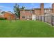 Spacious backyard featuring lush green lawn and a partial fence, perfect for outdoor activities at 4691 Shumate Dr, Stone Mountain, GA 30083