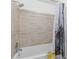 The bathroom has tile walls and a shower with a curtain at 4691 Shumate Dr, Stone Mountain, GA 30083