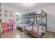 This bedroom features a bunk bed and cute decor for  at 4691 Shumate Dr, Stone Mountain, GA 30083