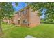 Charming brick home with a well-maintained lawn, offering a classic and inviting curb appeal at 4691 Shumate Dr, Stone Mountain, GA 30083