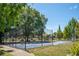 Outdoor basketball court in a lush park setting with trees and greenery at 943 Rose Sw Cir, Atlanta, GA 30310