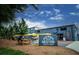 Picturesque brewery with outdoor seating and vibrant signage, creating a unique destination at 943 Rose Sw Cir, Atlanta, GA 30310