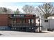 Commercial building with outdoor seating offers a great spot to relax and enjoy the neighborhood views at 943 Rose Sw Cir, Atlanta, GA 30310