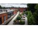 Retail complex with brick buildings and landscaping creates a vibrant shopping and dining destination at 943 Rose Sw Cir, Atlanta, GA 30310
