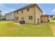 Side view of a well-maintained backyard with lush green grass at 1354 Slate Bend Dr, Dacula, GA 30019