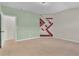 The carpeted bedroom features colorful accent walls at 1354 Slate Bend Dr, Dacula, GA 30019