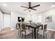 A dining room with modern decor, stylish furniture, and ample natural light at 2198 Star Mist Sw Dr, Atlanta, GA 30311