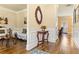 Hallway featuring hardwood floors, wainscoting, and decorative accents at 2602 Corey Park Dr, Loganville, GA 30052