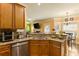 Functional kitchen with stainless steel appliances, granite counters, and eat-in breakfast bar at 2602 Corey Park Dr, Loganville, GA 30052
