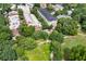 Aerial view showcases the property's location near green spaces and with beautiful mature trees at 273 12Th Ne St # 111, Atlanta, GA 30309