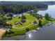 Picturesque park on the lake featuring playgrounds, lawns, and shady trees, perfect for outdoor Gathering activities at 4442 Academy St, Acworth, GA 30101