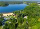 Lush wooded lot located near a sandy beach and serene lake, perfect for nature lovers and water enthusiasts at 4442 Academy St, Acworth, GA 30101