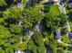 Residential neighborhood nestled among mature trees, showcasing well-maintained homes and lush green yards at 4442 Academy St, Acworth, GA 30101