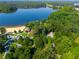Lakeside community with beach, docks, and park surrounded by lush trees, offering a serene and recreational environment at 4442 Academy St, Acworth, GA 30101