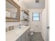 Bright bathroom with white cabinets, stylish sink, mirror, and shower showcasing modern fixtures at 4442 Academy St, Acworth, GA 30101