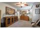 Spacious room featuring wood furniture, unique artwork, and natural light creating a warm atmosphere at 4442 Academy St, Acworth, GA 30101