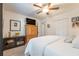 Spacious bedroom with a large wardrobe, TV and ceiling fan providing ample storage and entertainment at 4442 Academy St, Acworth, GA 30101