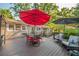 Inviting backyard deck with a dining set, lounge chairs, and grilling area for outdoor enjoyment and entertaining at 4442 Academy St, Acworth, GA 30101